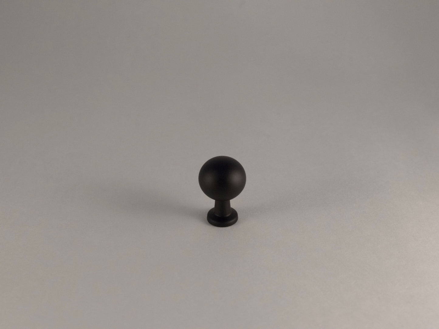black round knob